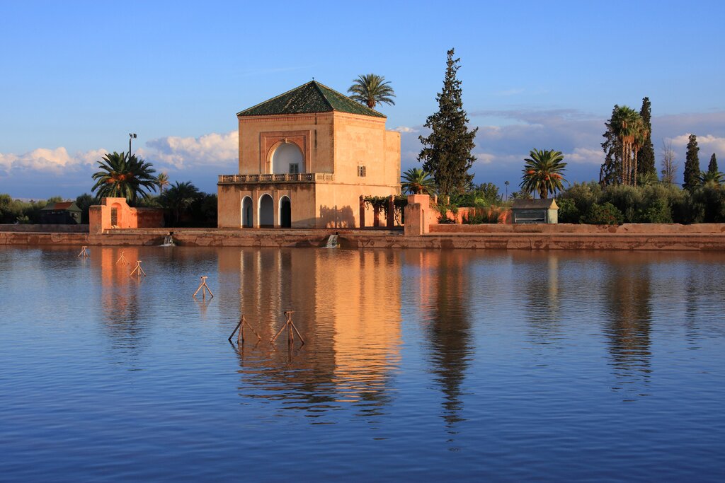 Menara Pavillion in front of lake at dusk