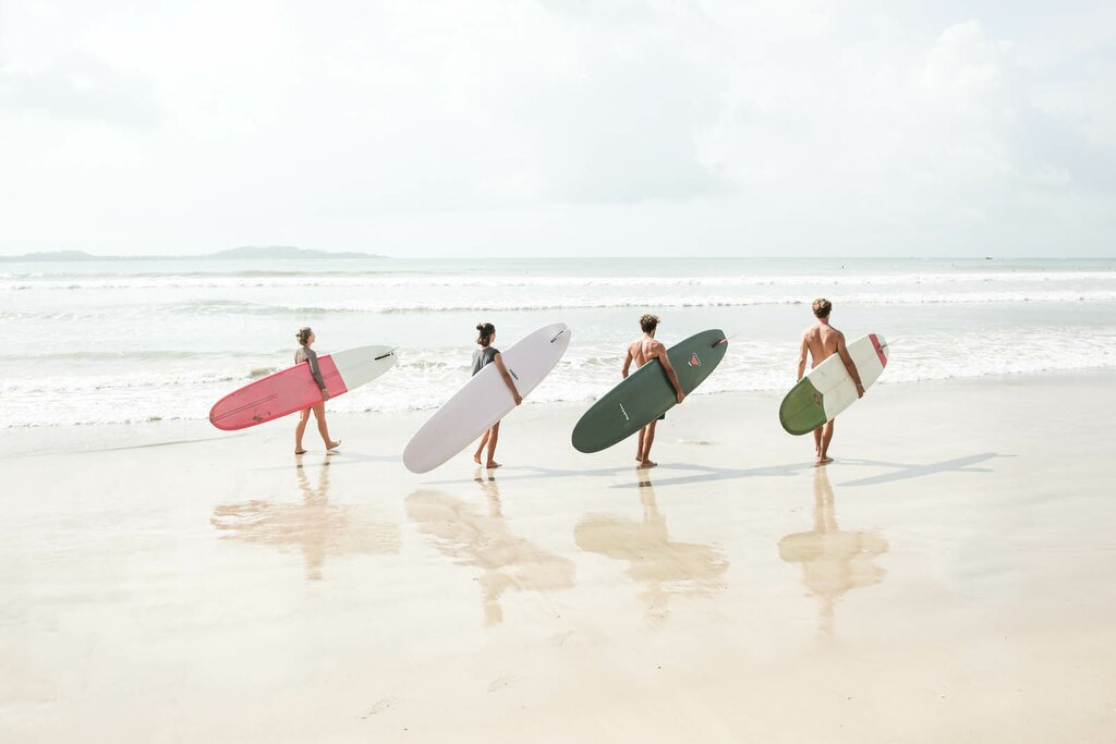 Surfers at Weligama surf point
