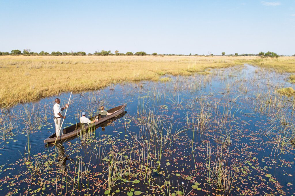 Glide over the water on a tradtional mokoro canoe