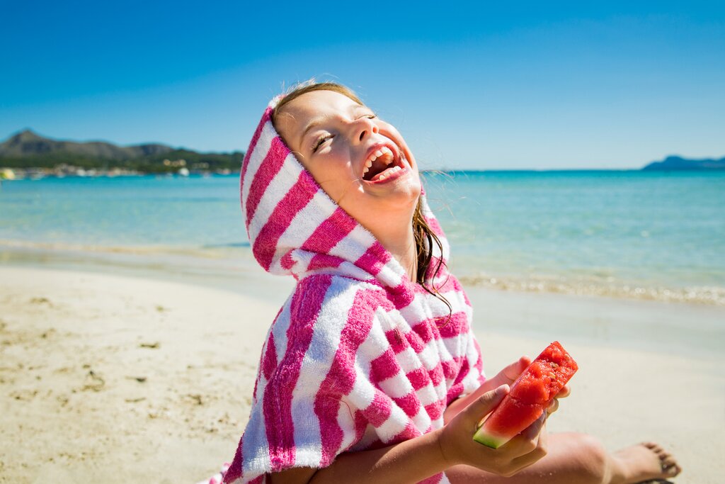 It doesn't get much better than fresh watermelon on the beach in Mallorca