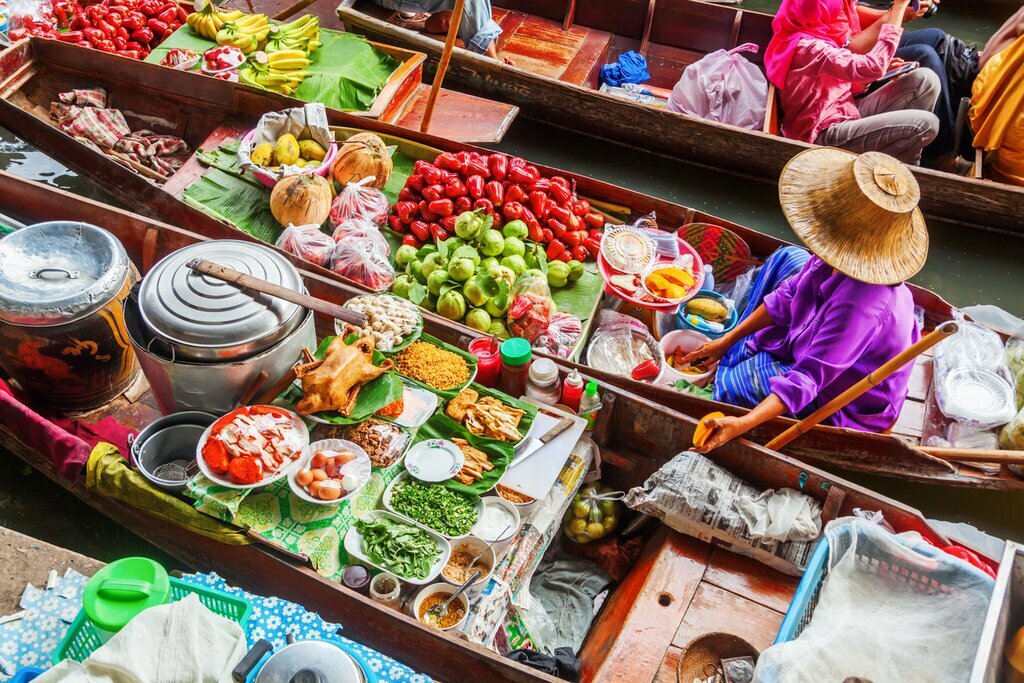 Sample Thailand's famous cuisine on land and water