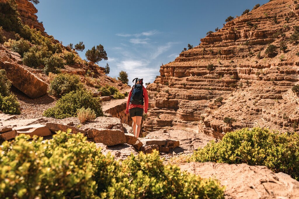 woman hiking in arid desert
