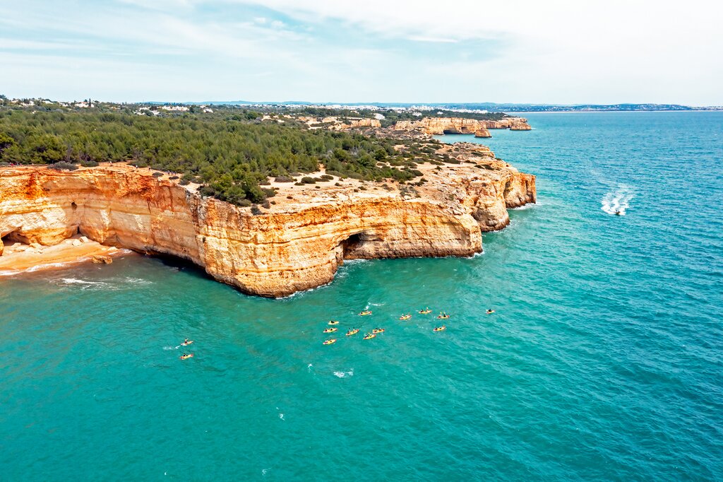 Kayaking towards the caves