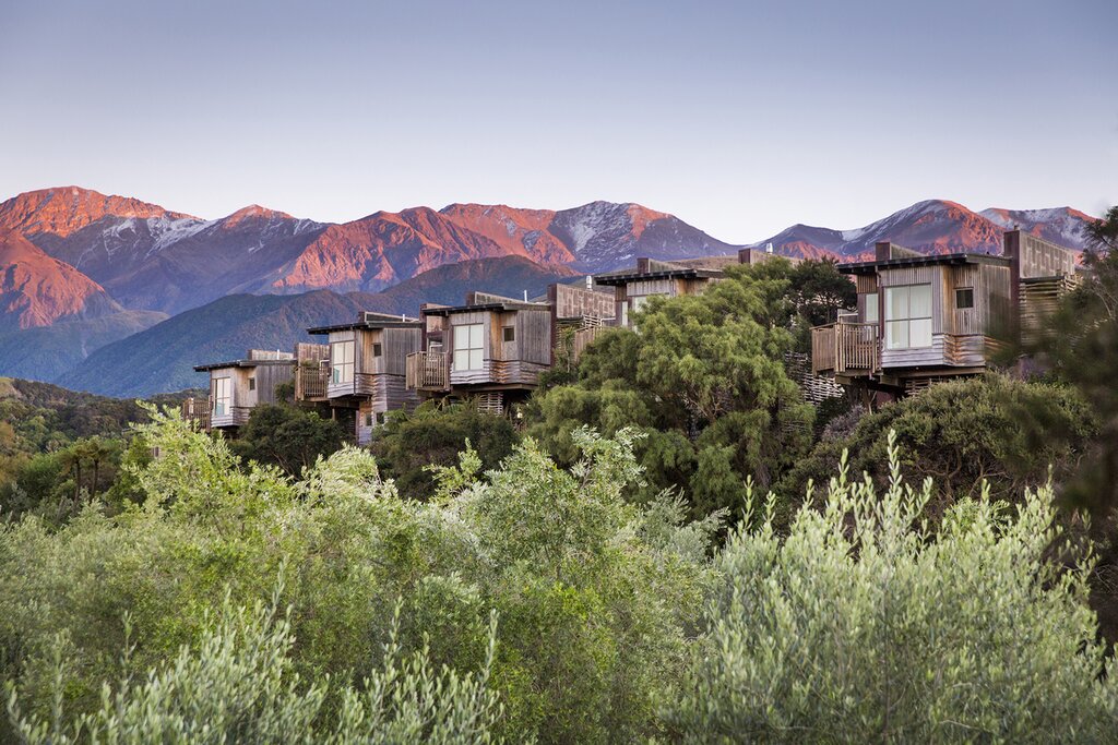 Stay at one-of-a-kind luxury retreats as you explore the South Island (photo courtesy of Hapuku Lodge and Tree Houses)