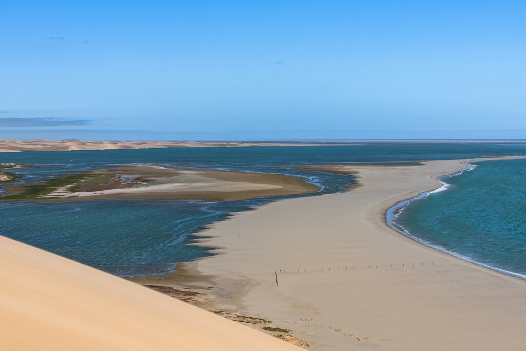 Golden dunes of the Skeleton Coast fall into the Atlantic Coast
