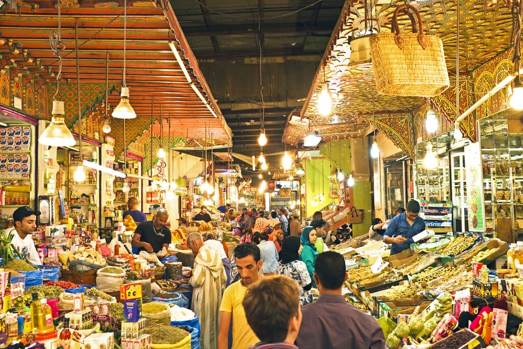 Shop for local ingredients in the Moroccan souks, like this one in Fes