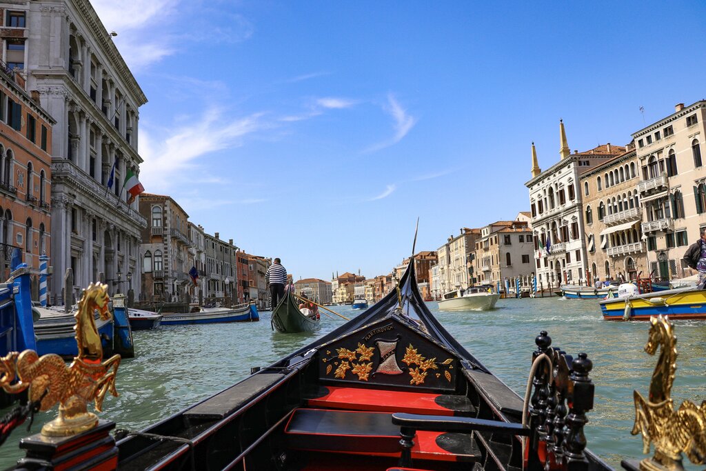 Enjoy a Gondola ride along the Grand Canal