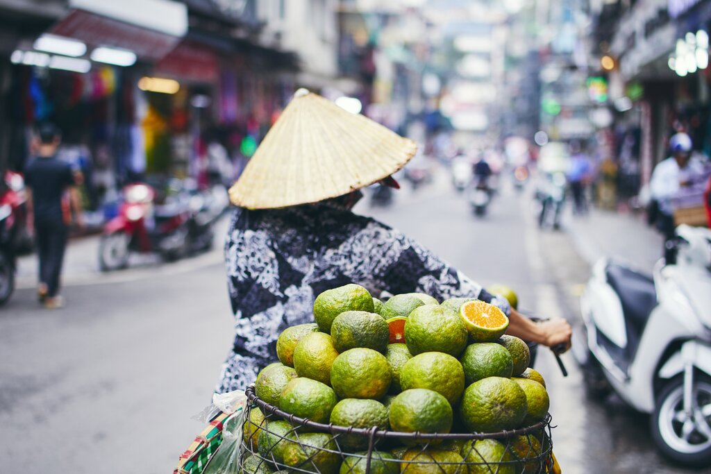 Vendors sell Vietnamese produce and delicacies on the streets of Hanoi