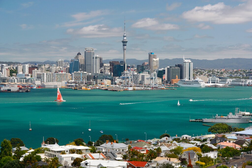 Auckland's unmistakable skyline, where the Tasman Sea meets the Pacific Ocean