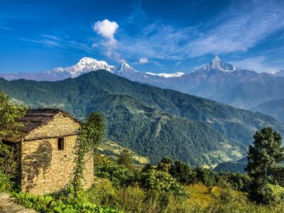 Himalaya mountains and old stone cabin near Pokhara in Nepal